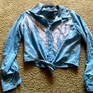 Kittenish fringe top